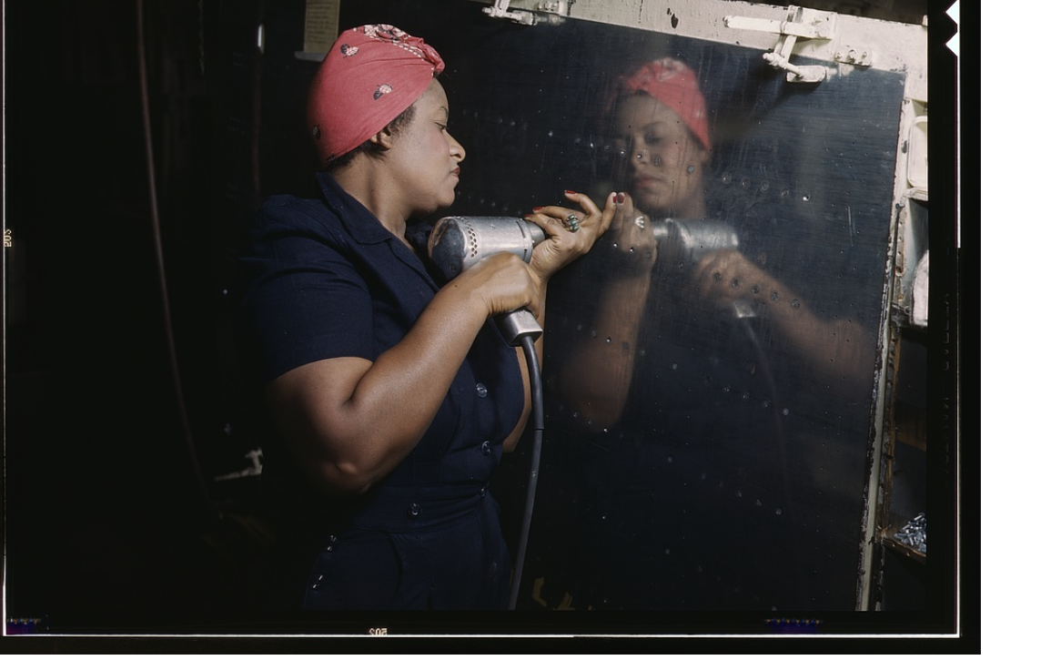 Alfred T. Palmer, 'Operating a hand drill at Vultee-Nashville, woman is working on a ‘Vengeance’ dive bomber' (1943) via the Library of Congress