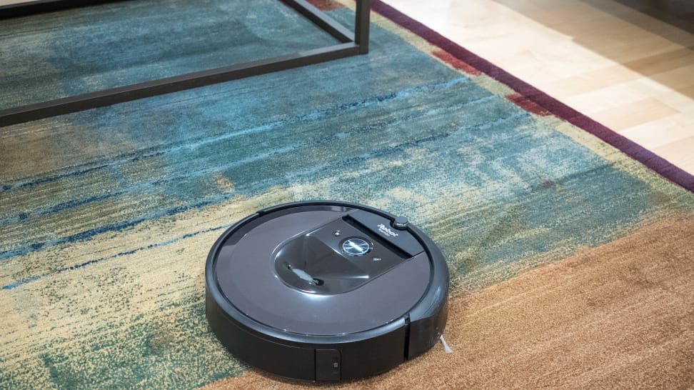 A roomba, a small robotic vacuum cleaner